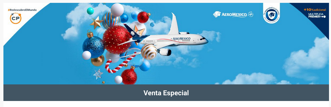 a plane flying in the sky with colorful balls and candy canes