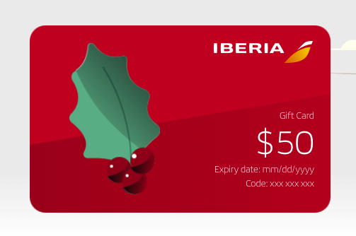 a red gift card with a green leaf and berries