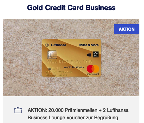 a gold credit card on a marble surface