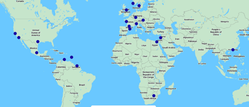 a map of the world with blue dots