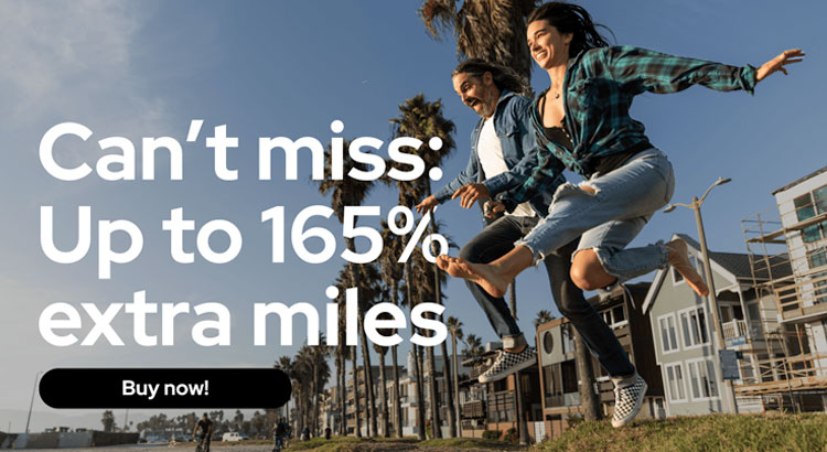 a man and woman jumping in the air